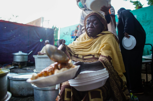 Sudane woman cooking
